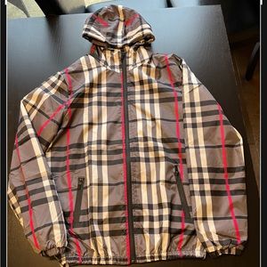 Jacket- women’s wind breaker, light weight, colourful with hood, size medium